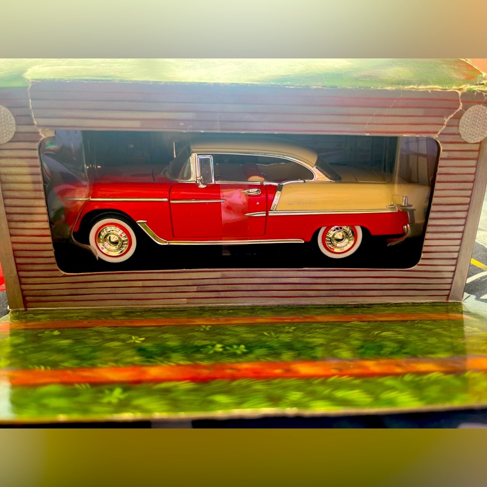 1955 Chevy Bel Air. Still in box model car in mint condition box has some wear.